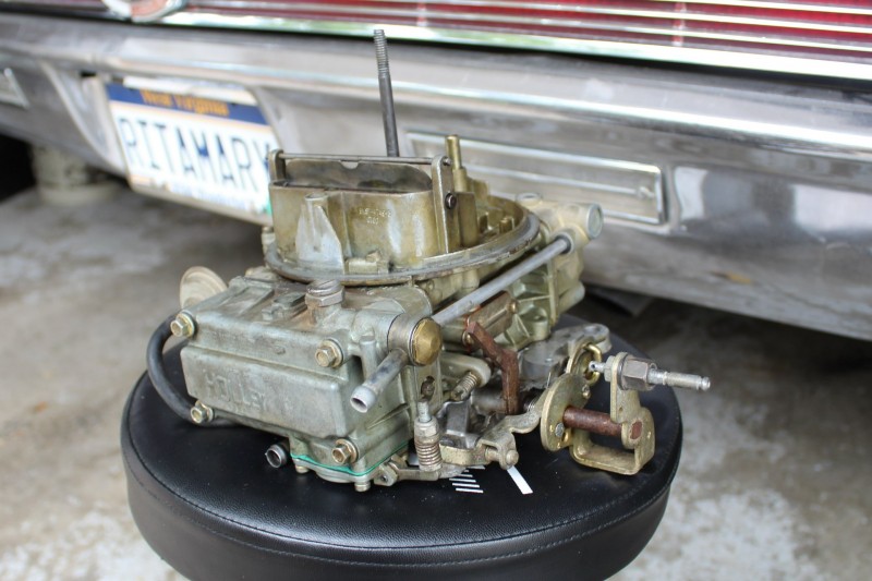 Here's the carb before shipping it. Note the nipple for a rubber hose on the front of the carb.